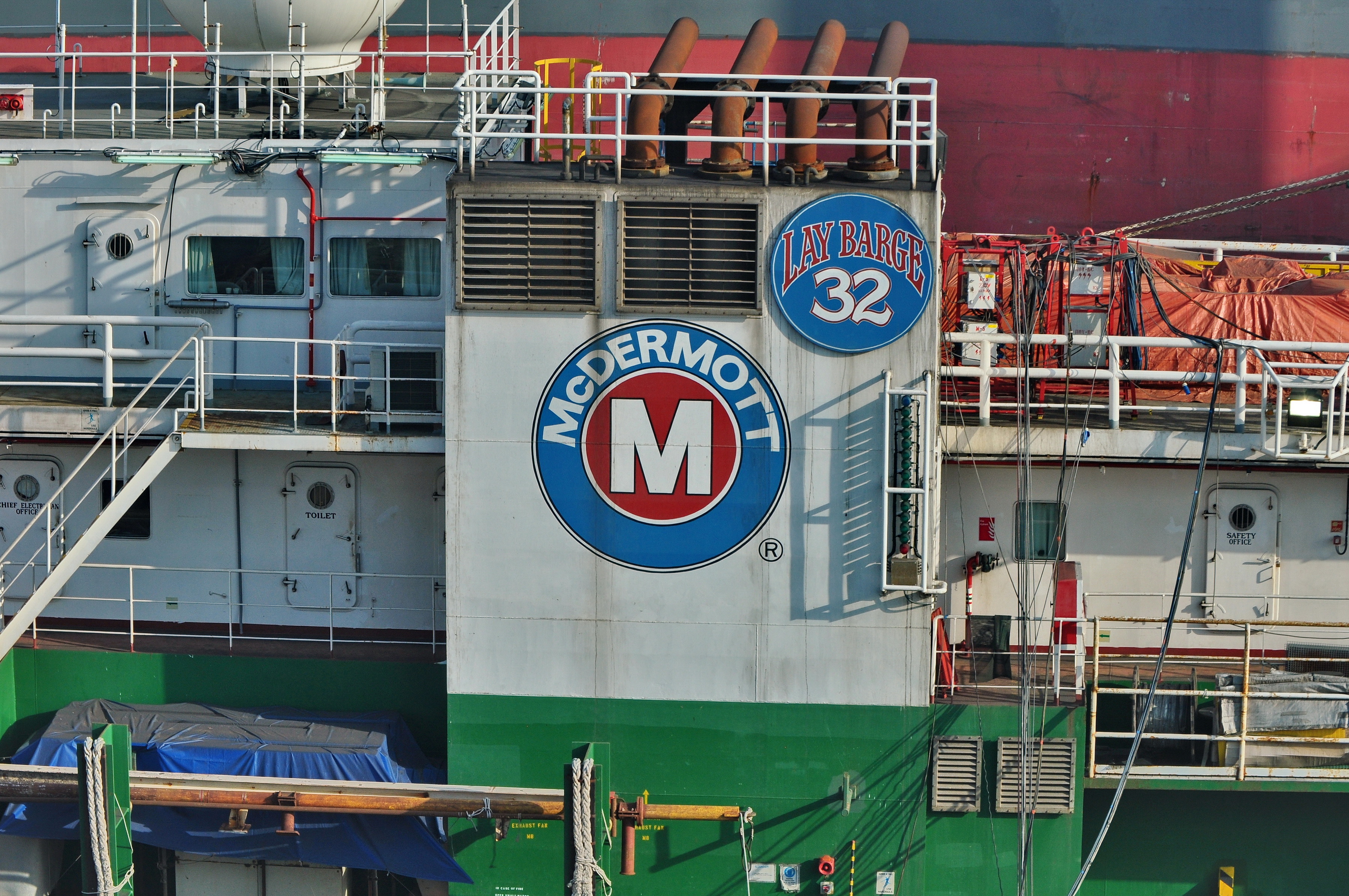 MCDERMOTT LOGO ON DERRICK BARGE NO. 32